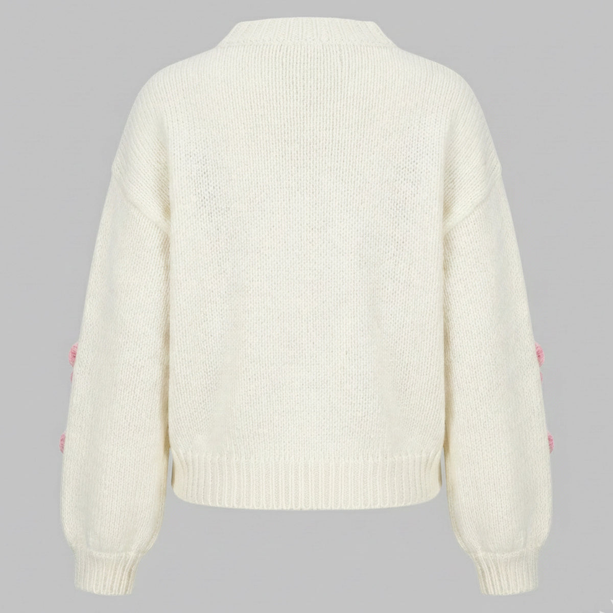 White sweater on a gray background