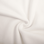 Close-up of white fabric with a subtle texture