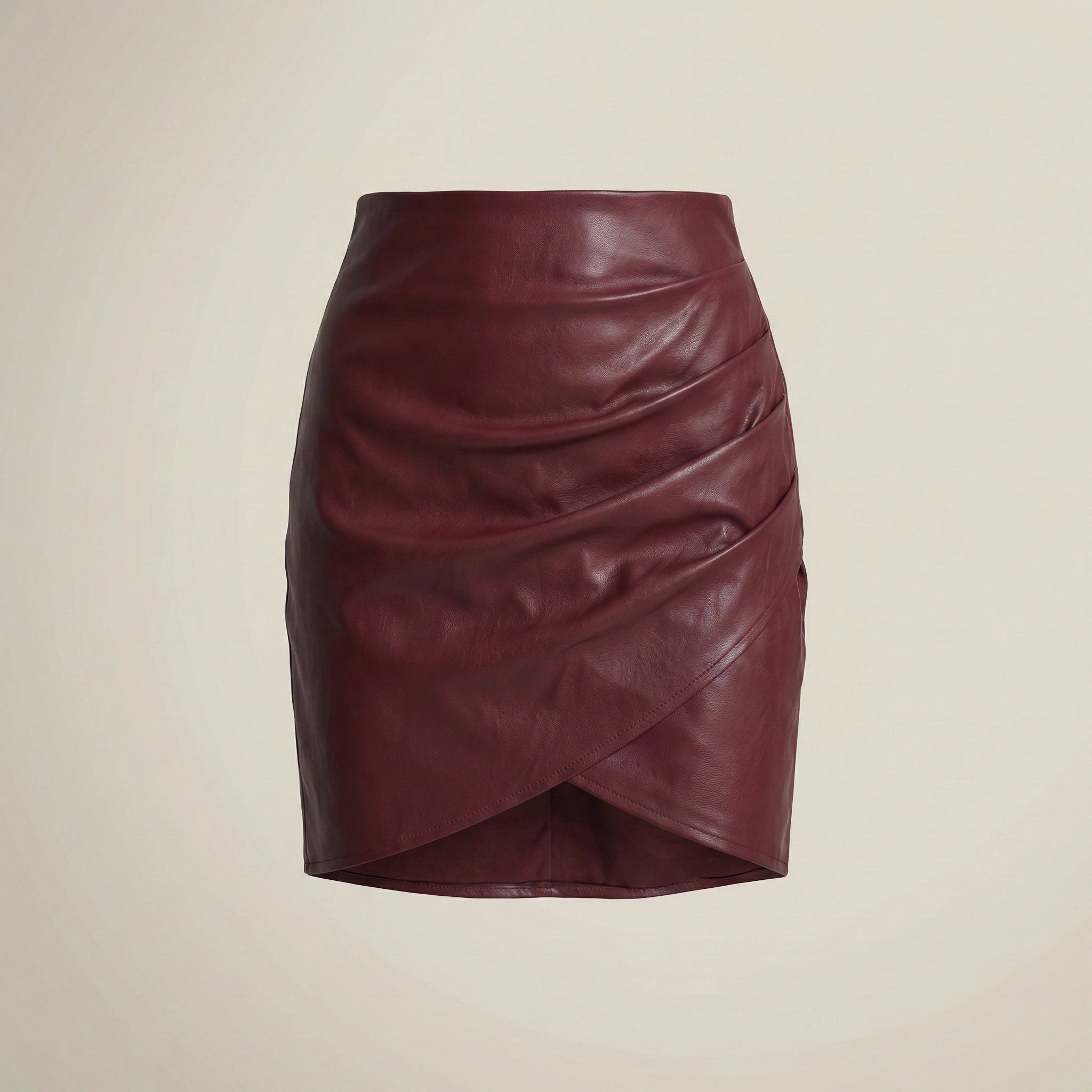 Maroon leather skirt on a beige background