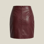 Maroon leather skirt on a beige background