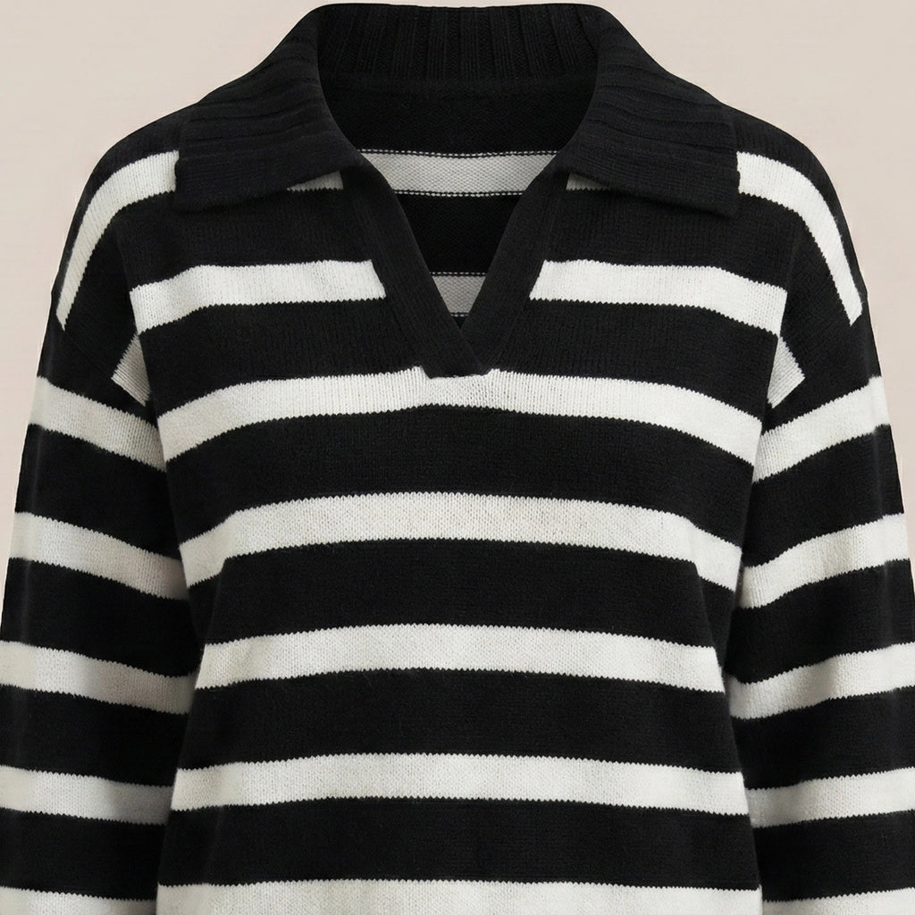 Black and white striped sweater on a beige background