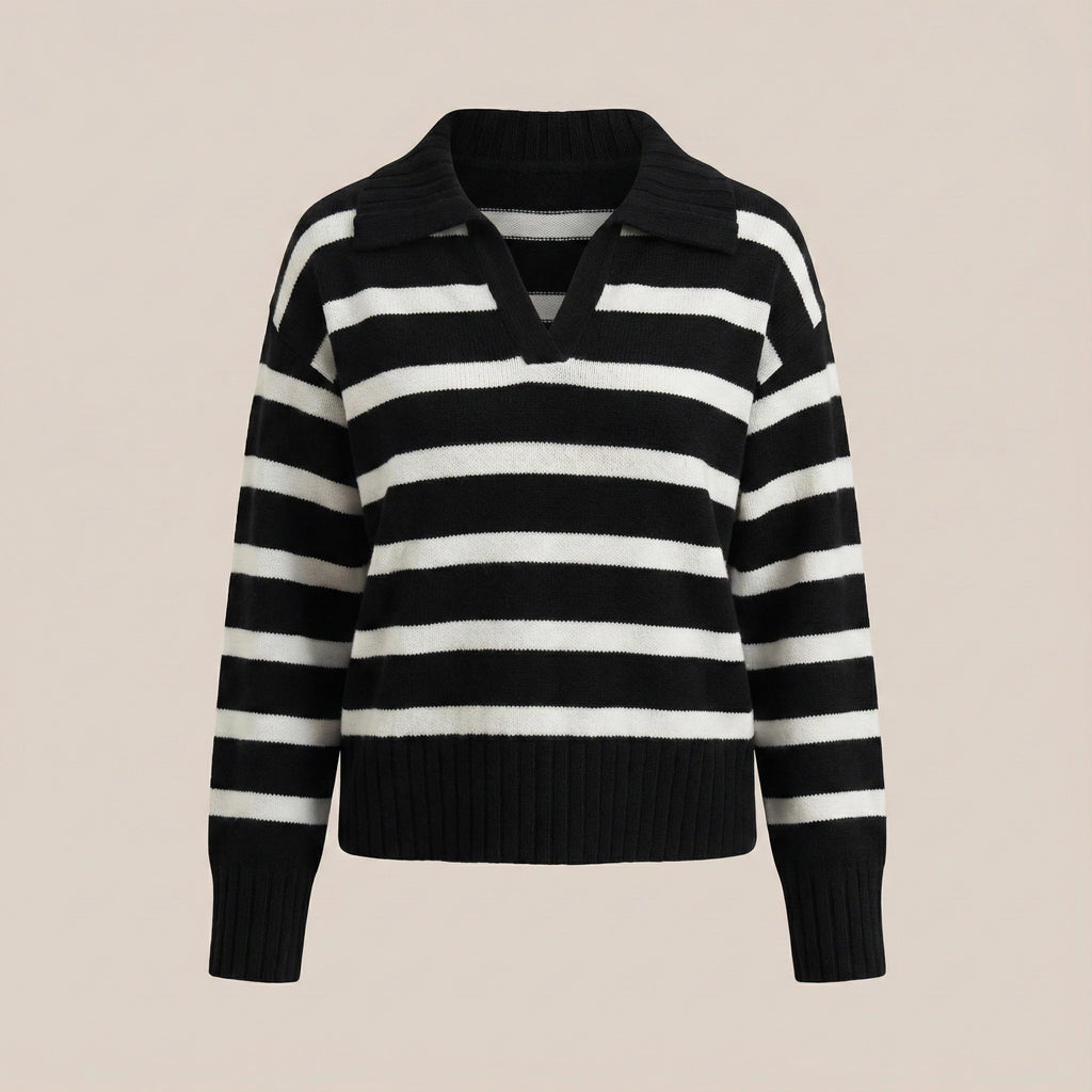 Black and white striped sweater on a beige background