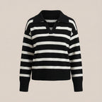 Black and white striped sweater on a beige background