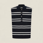 Black and white striped sleeveless shirt on a beige background
