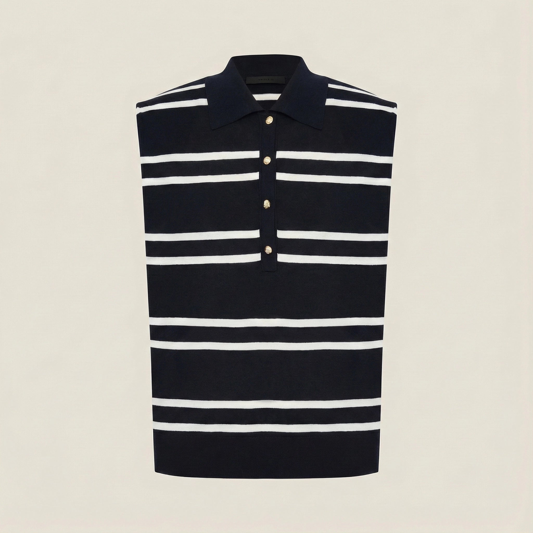 Black and white striped sleeveless shirt on a beige background