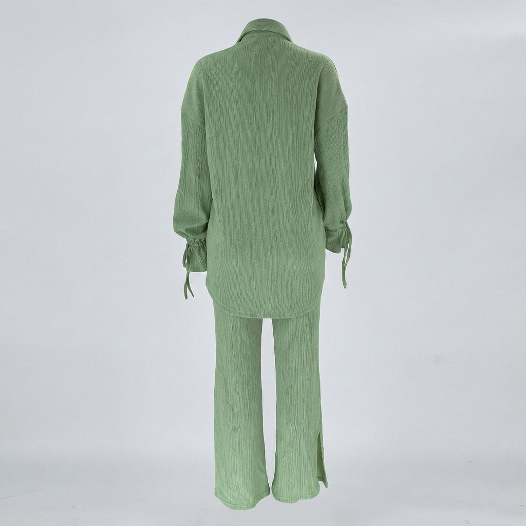 Green ribbed pajama set on a white background