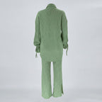 Green ribbed pajama set on a white background