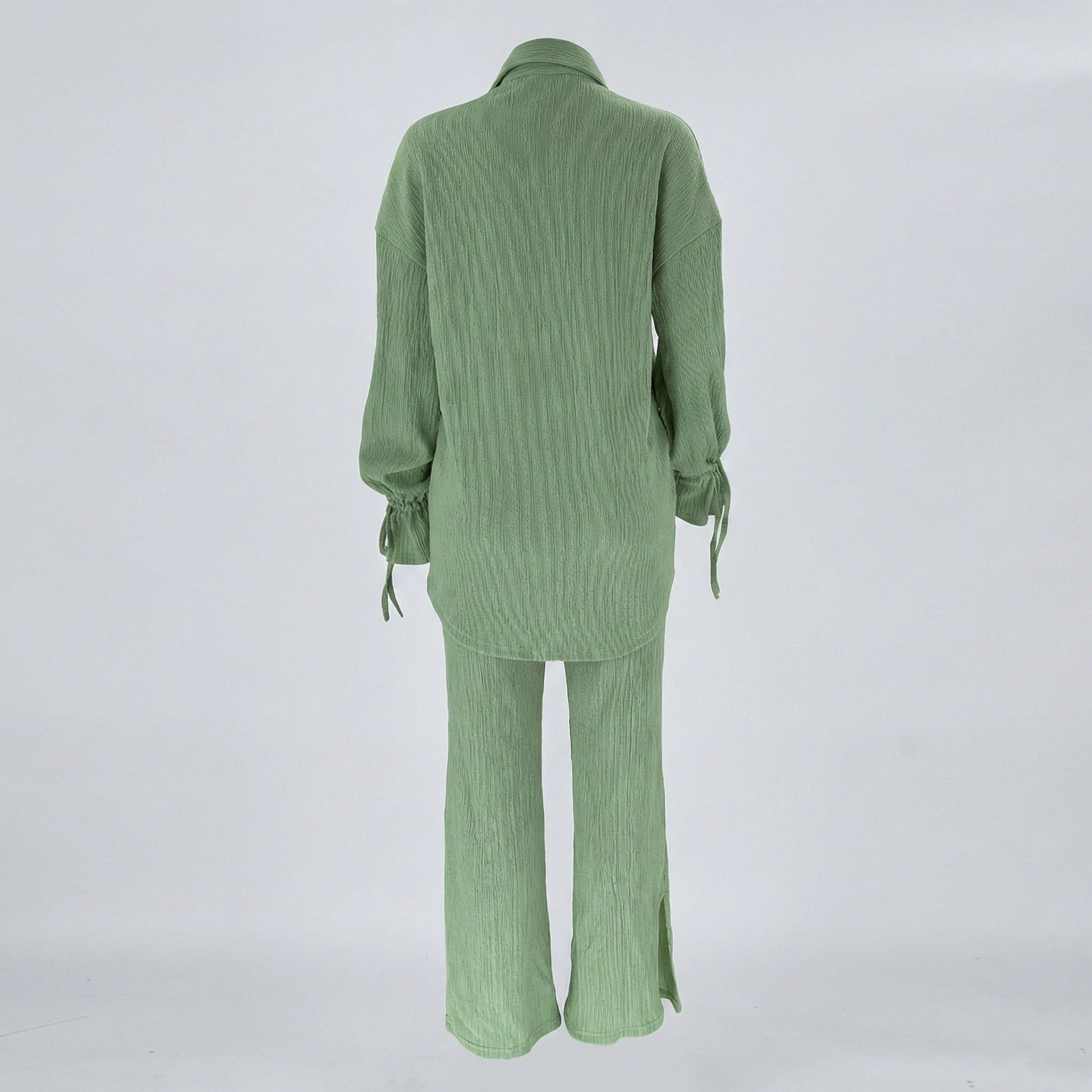 Green ribbed pajama set on a white background
