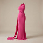 Pink one-shoulder gown on a beige background