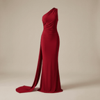 Red one-shoulder gown with a long train on a beige background