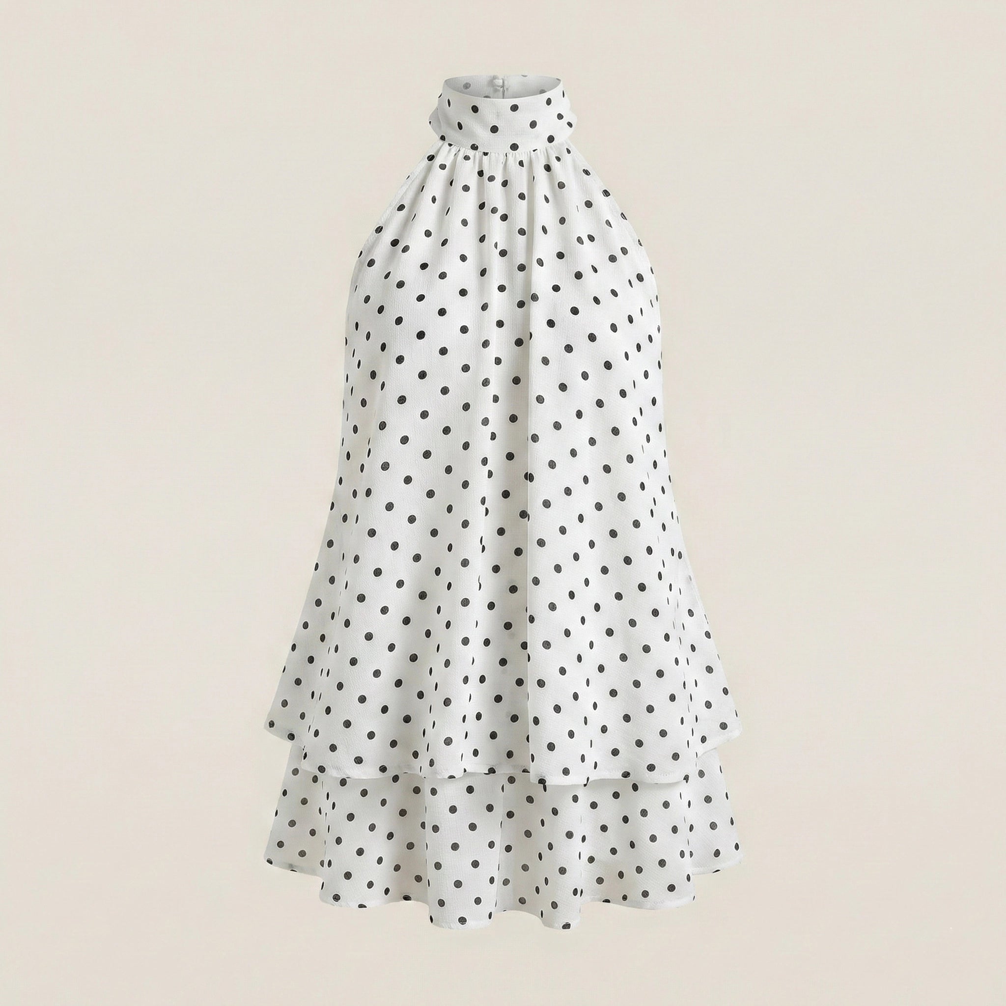 White skirt with black polka dots on a beige background
