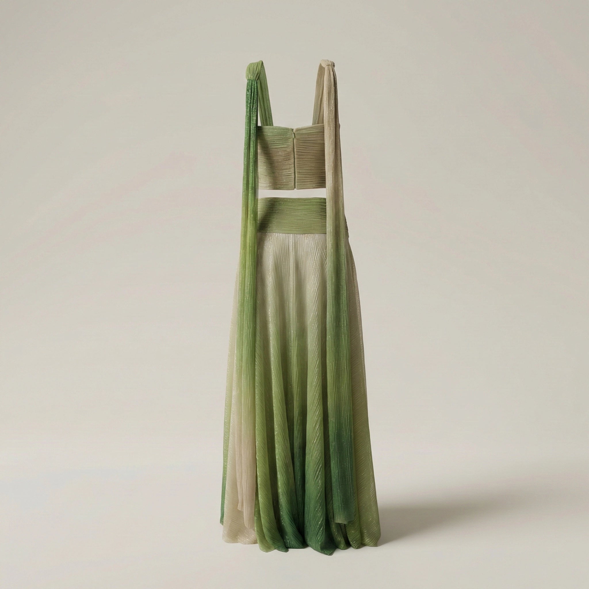 Green gradient dress on a light gray background