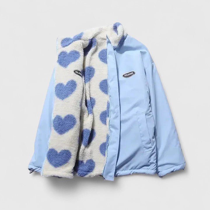 Light blue jacket with a heart-patterned scarf on a white background