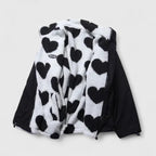 Black and white heart-patterned jacket on a light gray background
