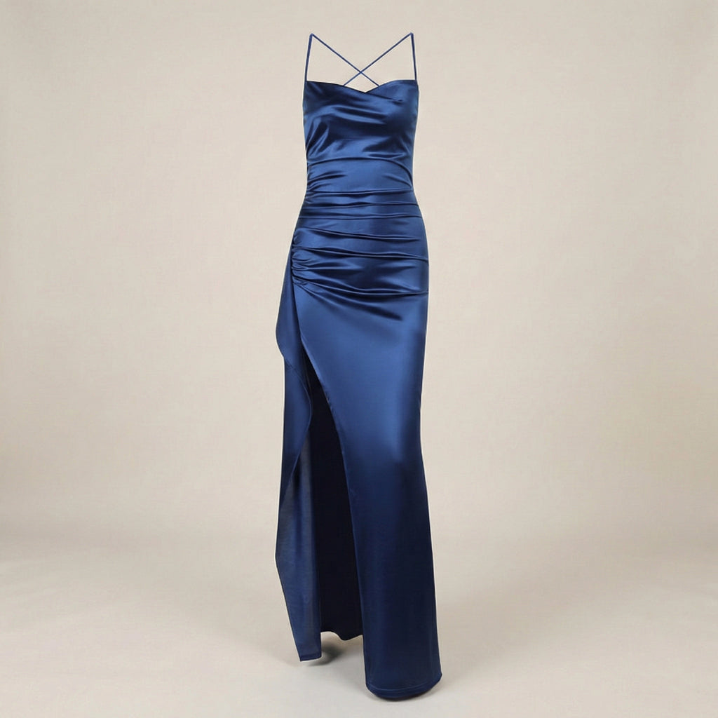 Blue satin evening gown with thin straps on a beige background