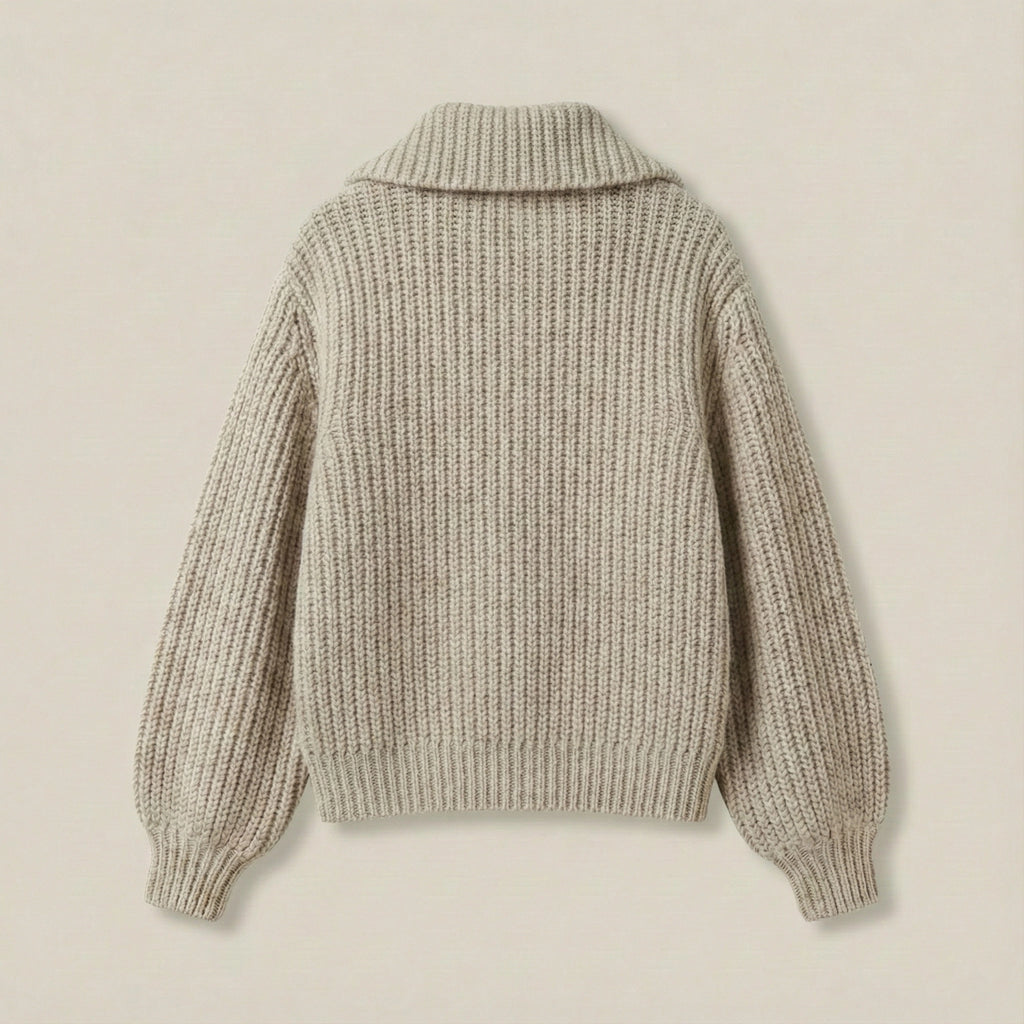 Knitted sweater on a beige background