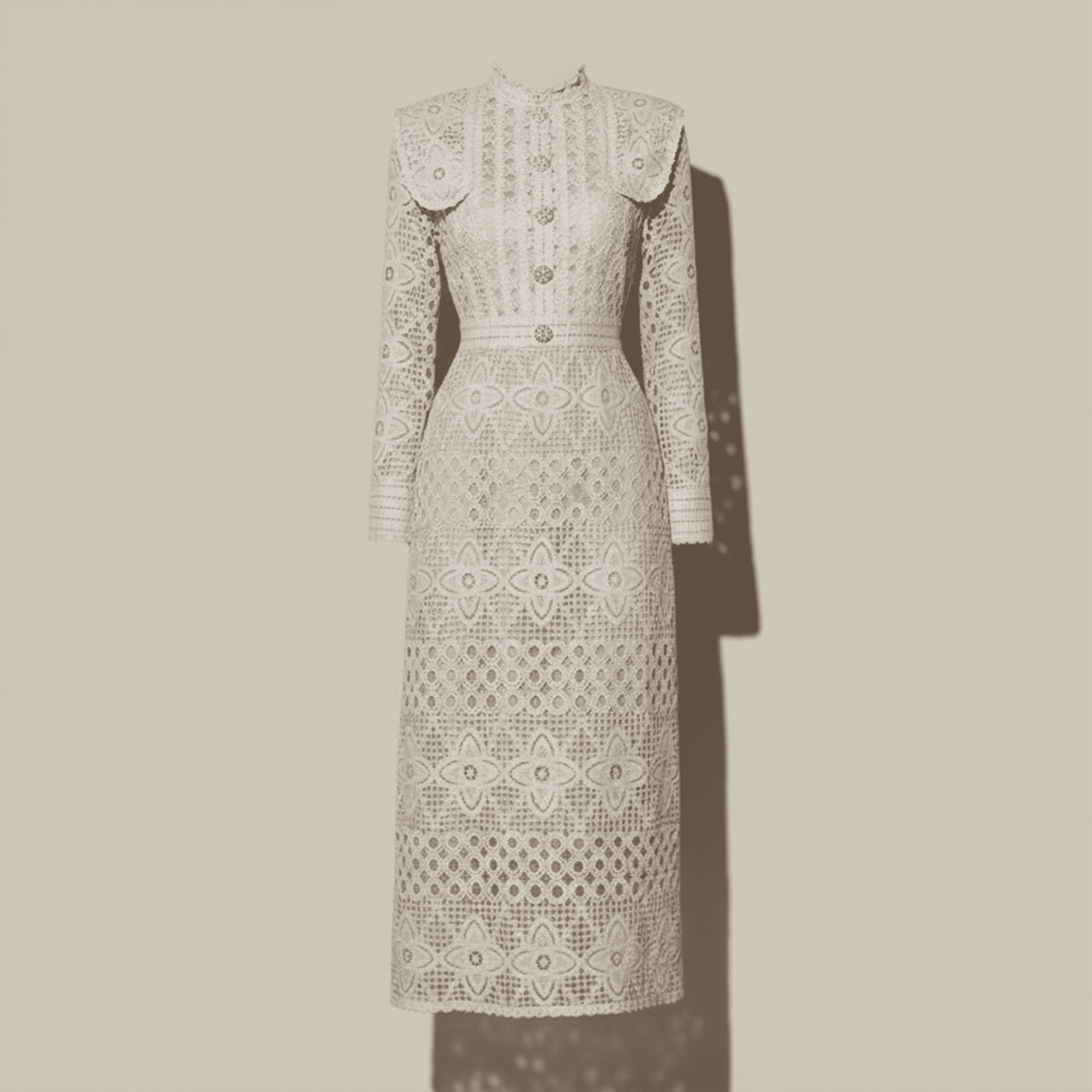 Lace dress with long sleeves on a beige background