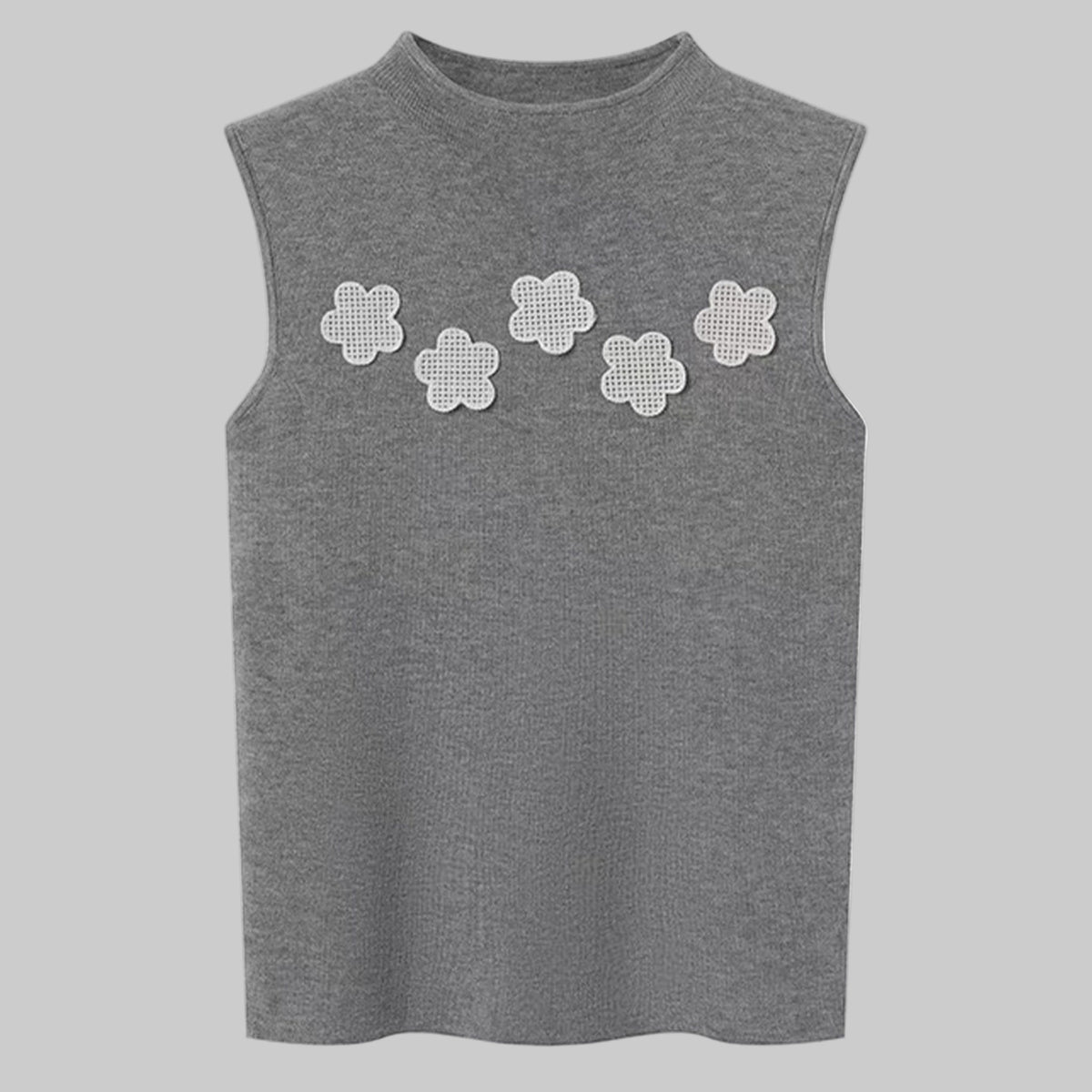 Gray sleeveless top with white floral patterns on a white background