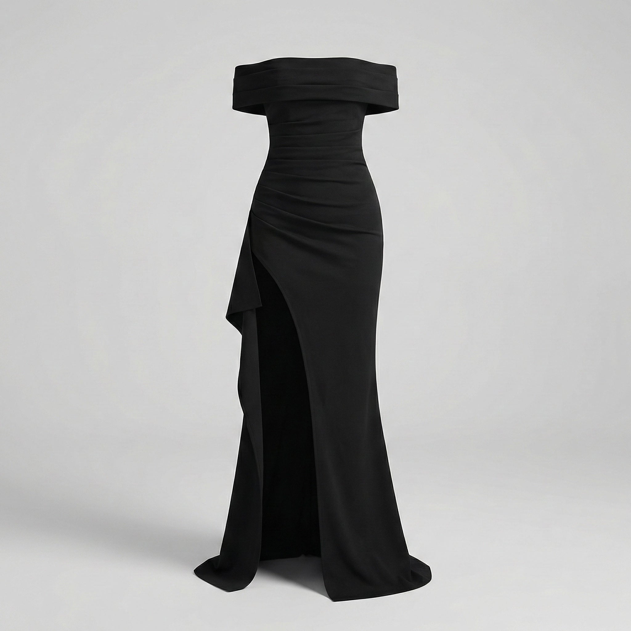 Black off-shoulder evening gown on a light gray background
