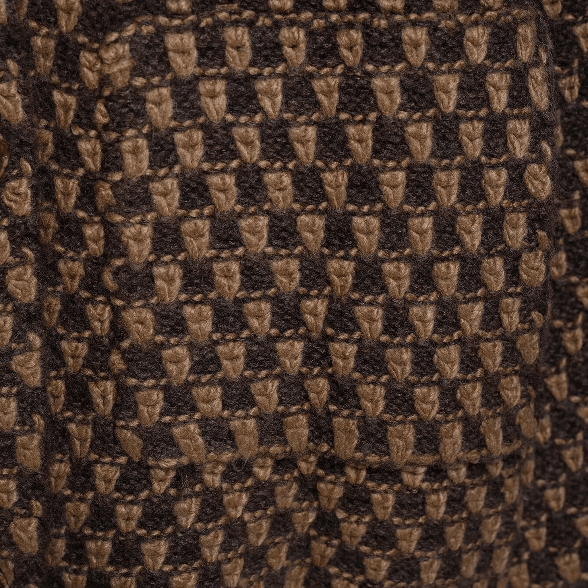 Close-up of a brown and beige checkered pattern fabric