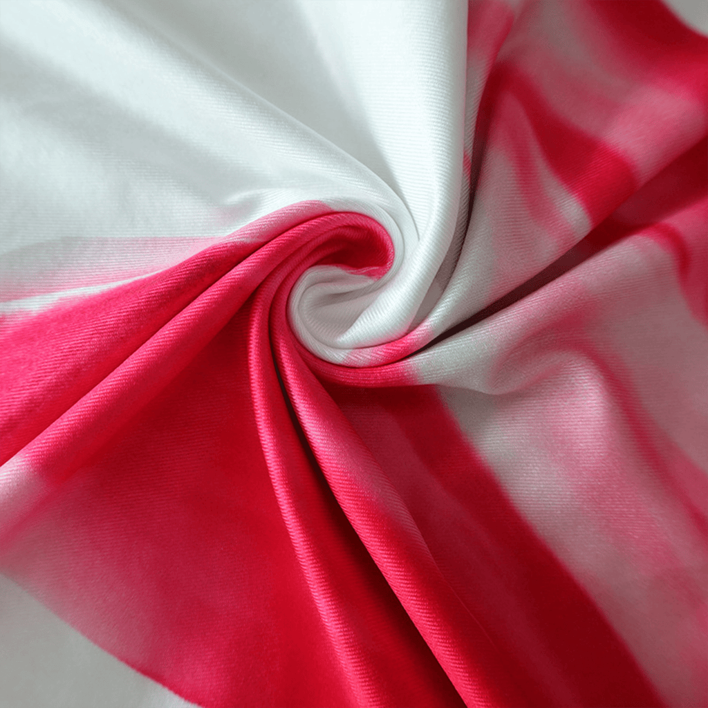 Close-up of red and white fabric with a swirl pattern