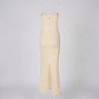 Cream-colored slip dress on a light gray background