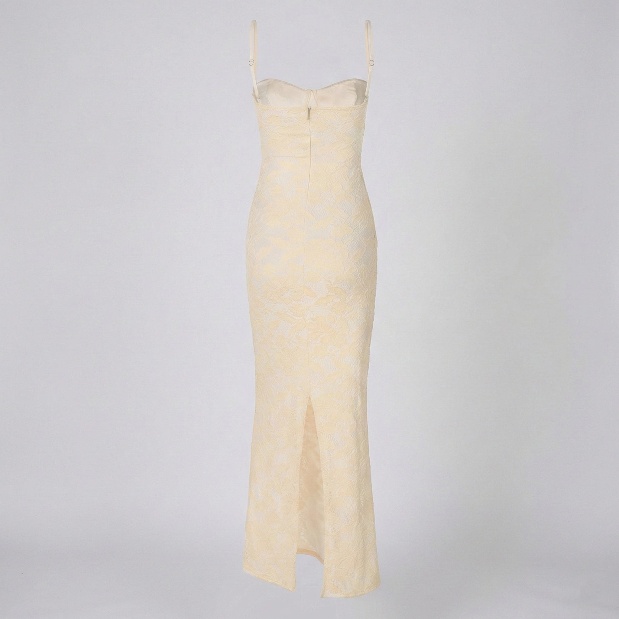 Cream-colored slip dress on a light gray background