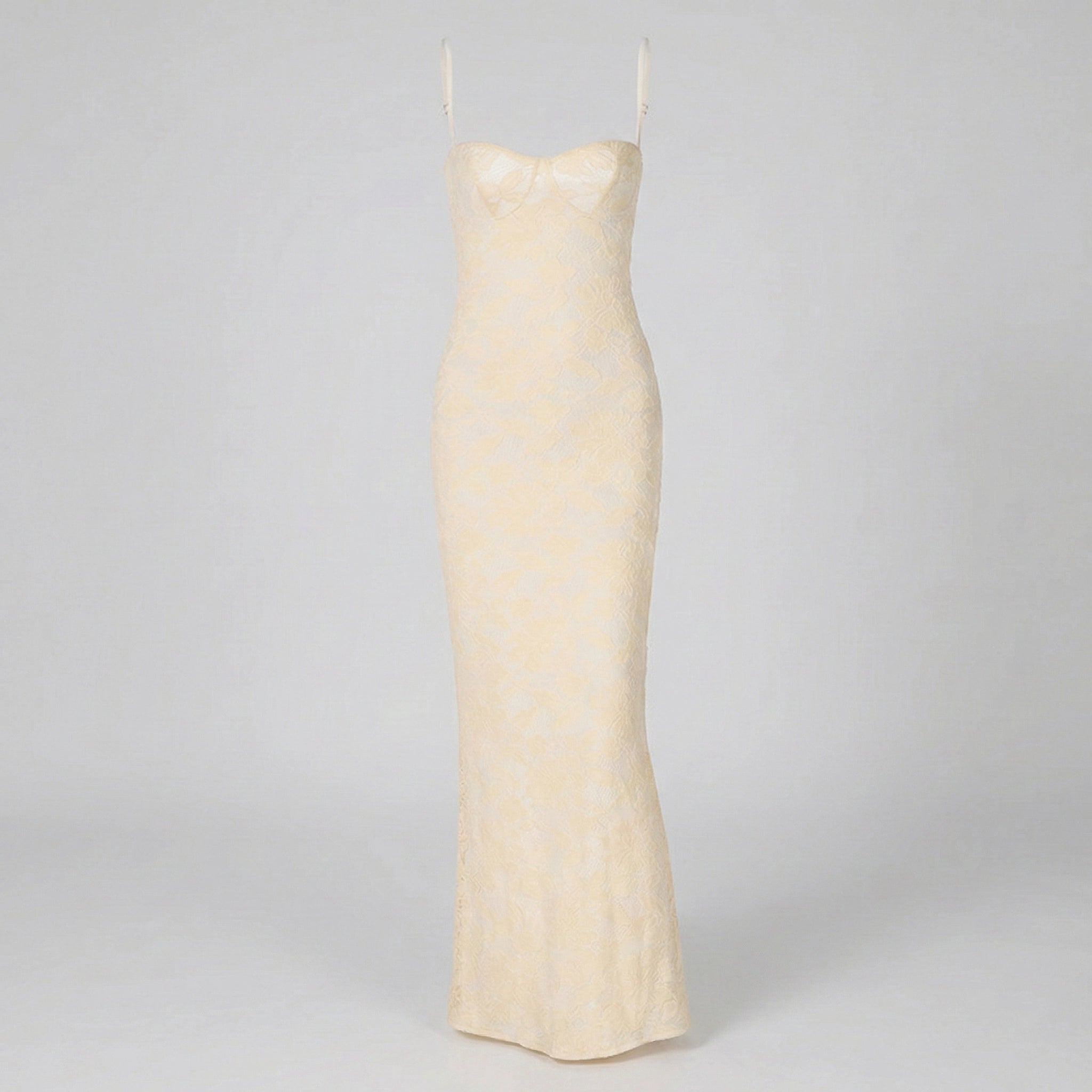 Beige slip dress on a gray background