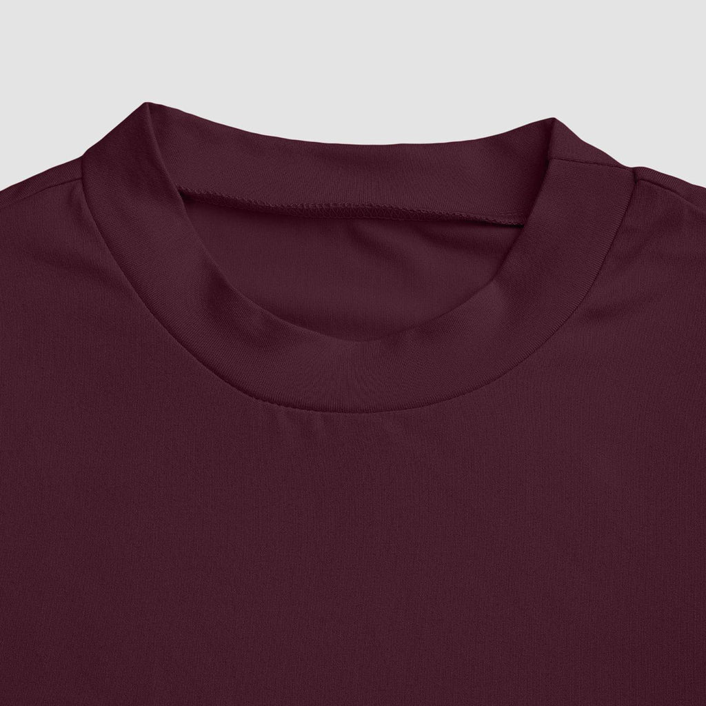 Close-up of a maroon shirt collar on a light gray background