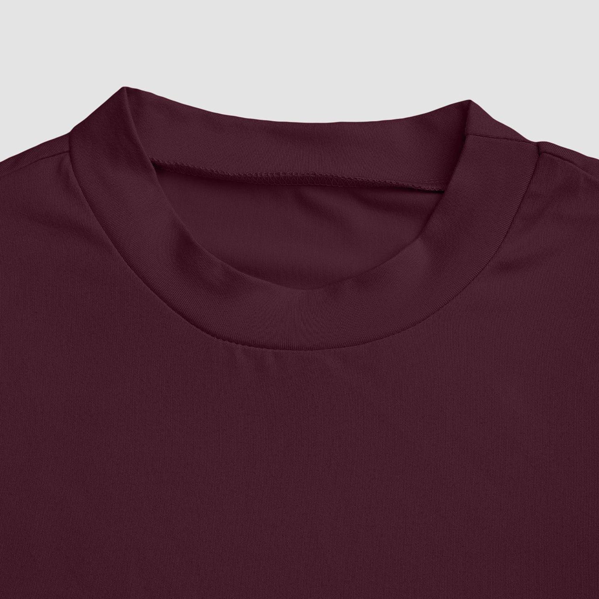Close-up of a maroon shirt collar on a light gray background