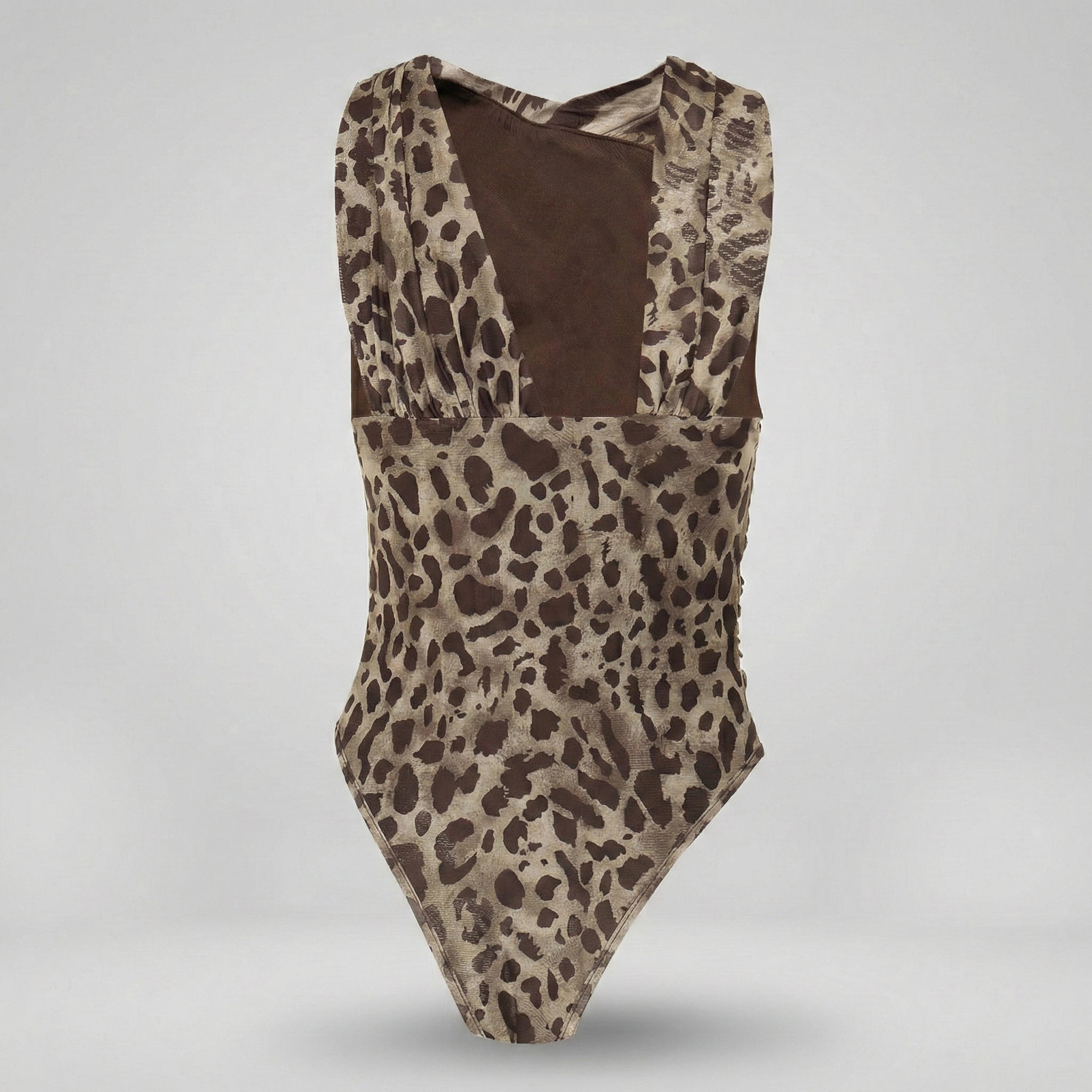 Leopard print swimsuit with brown interior on a light gray background