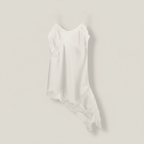 White slip dress on a mannequin against a plain background