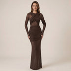 Woman wearing a brown evening gown on a beige background
