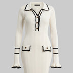 White ribbed dress with black accents on a white background