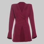 Maroon blazer on a light gray background