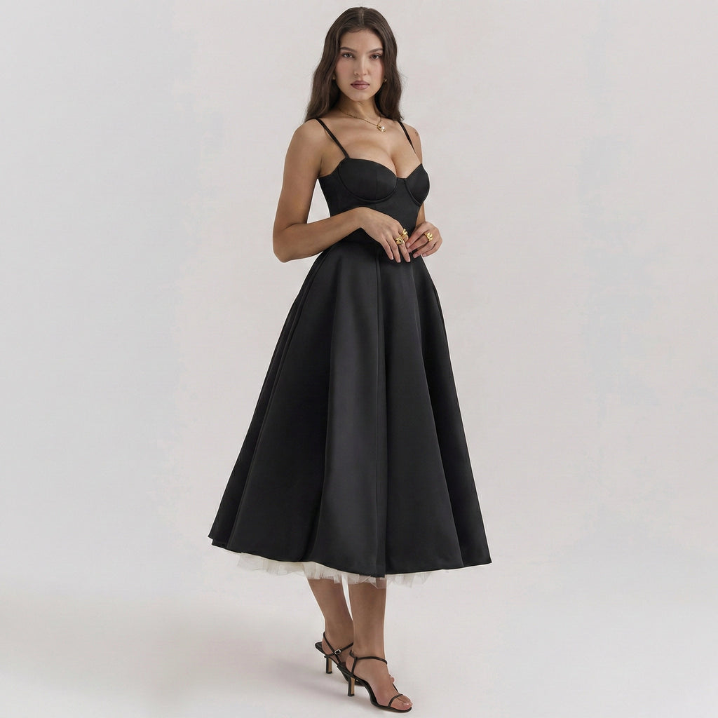 Woman wearing a black dress on a white background