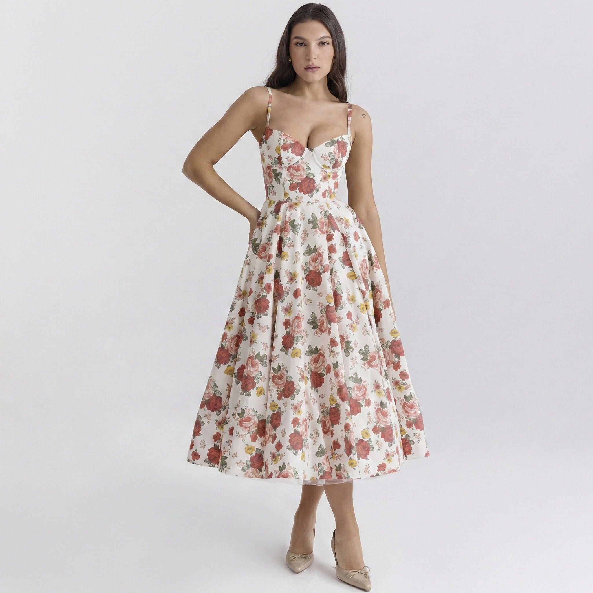 Woman wearing a floral dress on a white background