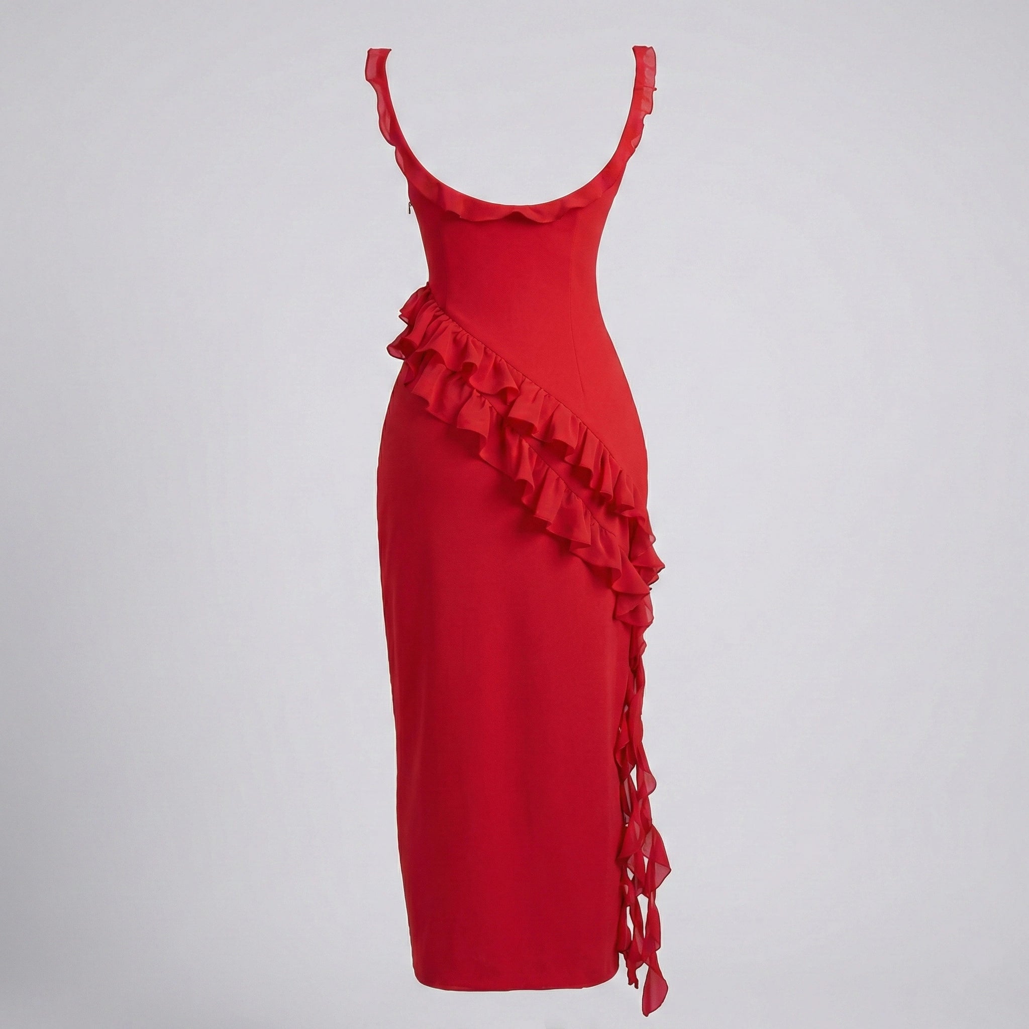 Red dress with ruffled details on a gray background