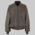 Brown suede jacket on a white background