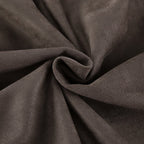 Close-up of dark brown fabric with a textured surface