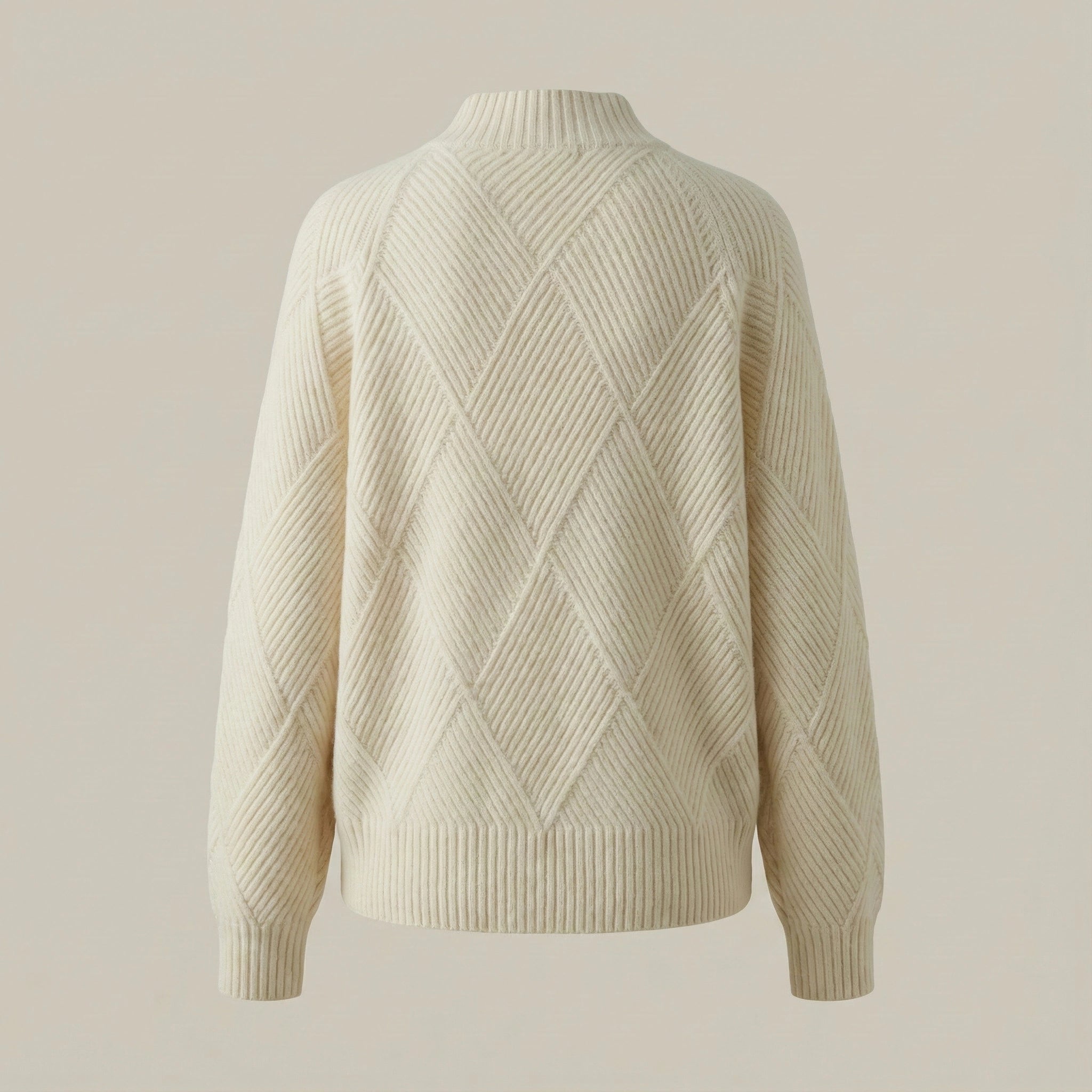Beige sweater with a textured pattern on a beige background