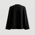 Black cape on a light gray background