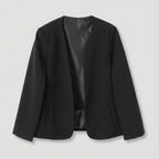 Black blazer on a light gray background