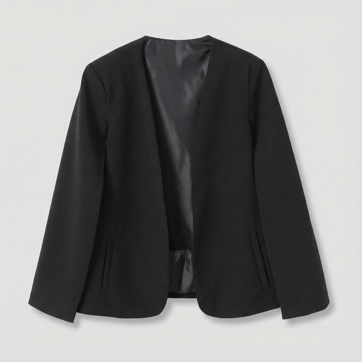 Black blazer on a light gray background