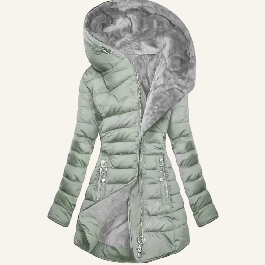 A women's long puffer coat in a muted sage green color, featuring a plush gray faux-fur lined hood and matching gray lining visible along the front zipper and pockets, set against a plain white background.