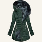 Green puffer coat with fur-lined hood on a white background