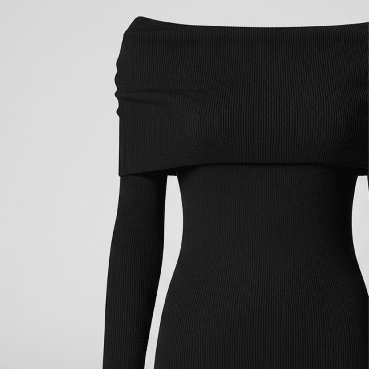 Black off-shoulder top on a light gray background