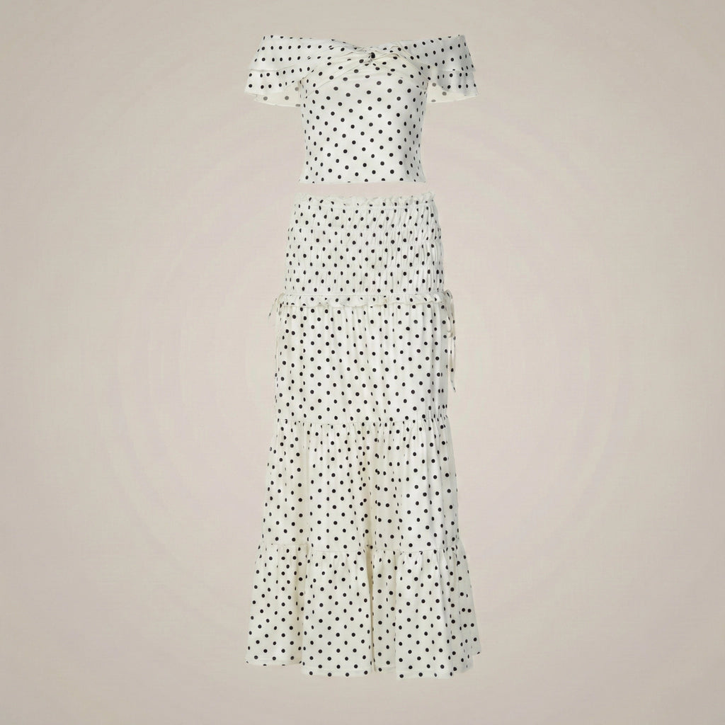 Polka dot off-shoulder top and pants set on a beige background