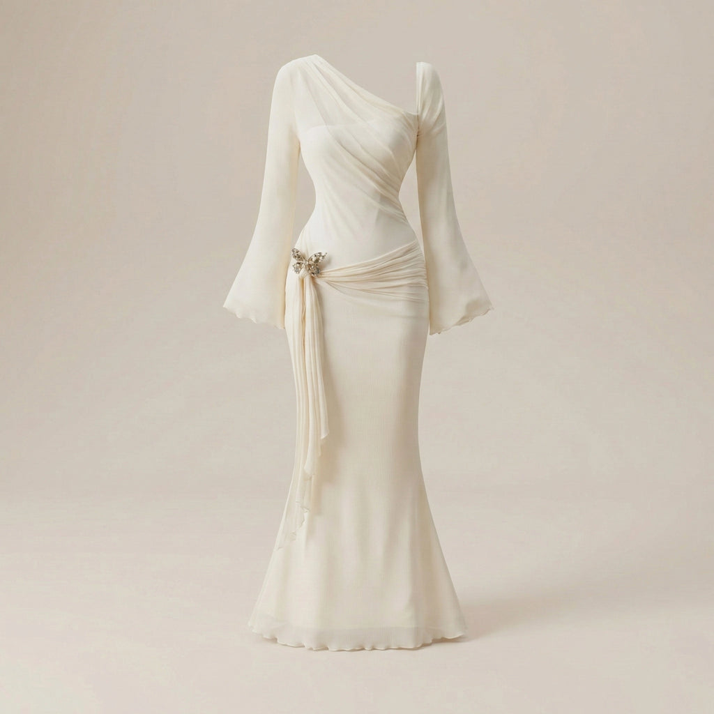 Elegant one-shoulder white dress with long sleeves on a beige background