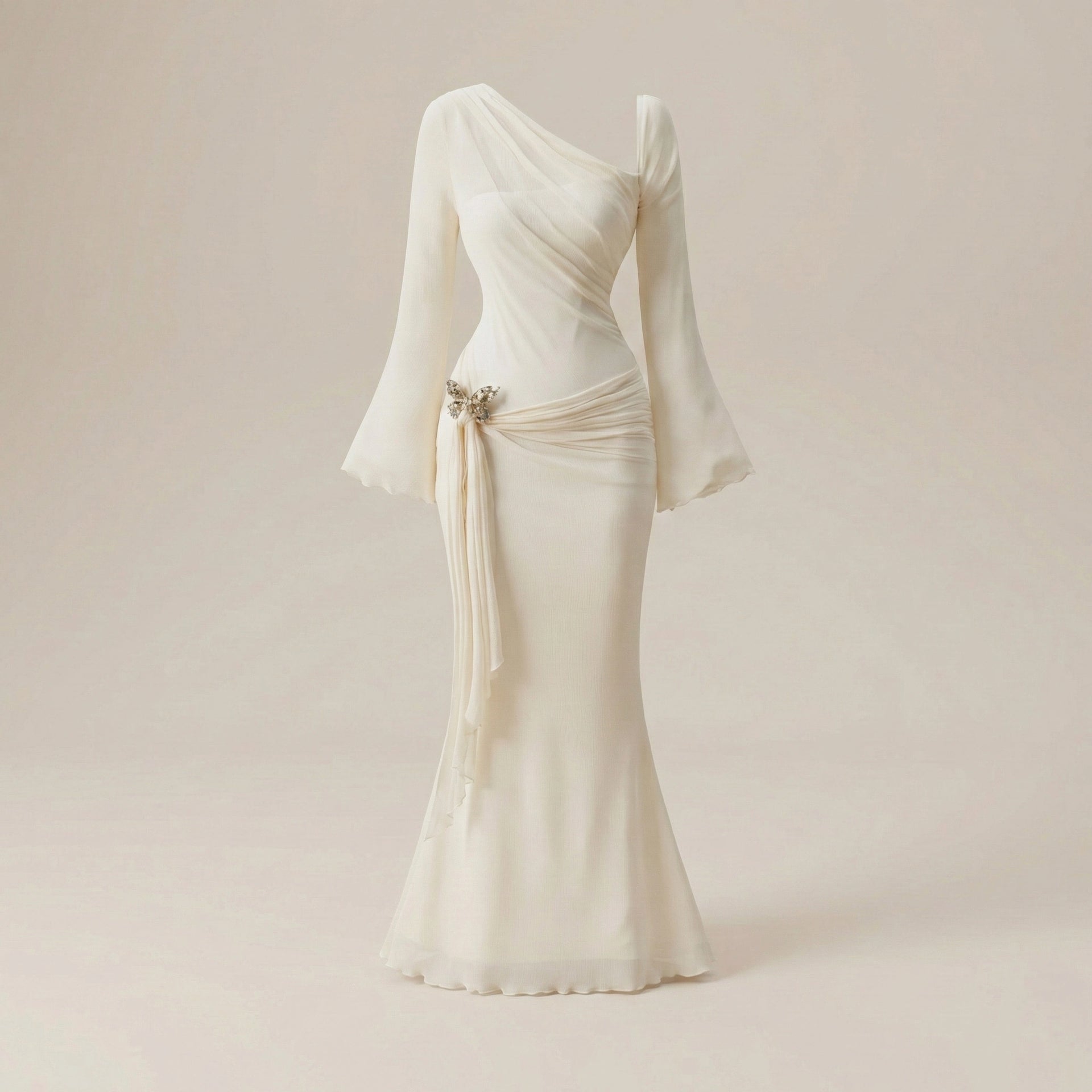 Elegant one-shoulder white dress with long sleeves on a beige background